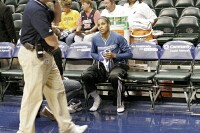  - Lindsey Harding needed a quick shoe change before the game started