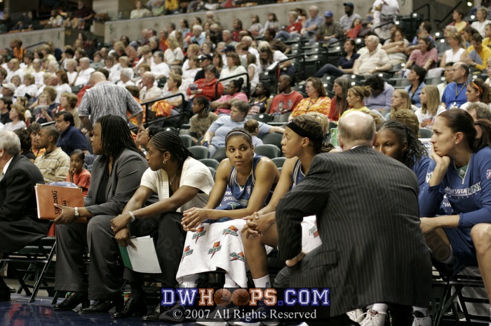 Lindsey gets some coaching on the bench - she went out just before Ali scored, and would return midway through the 2nd quarter.